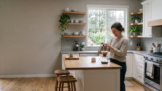 Woman making a pour over coffee in a kitchen
