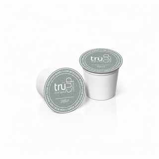 Light Roast coffee pod with a white background